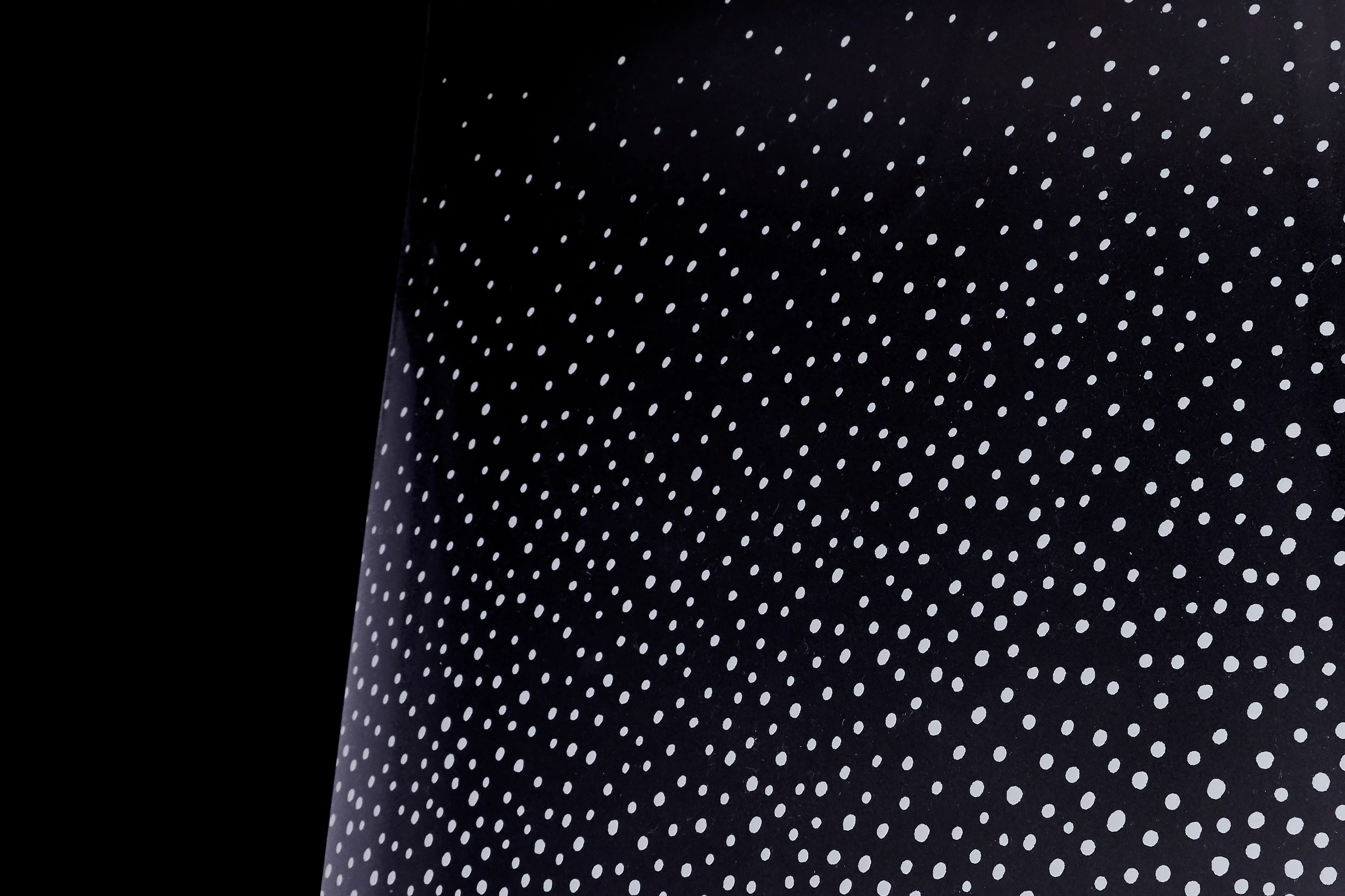 Image chowing close up of FASARA Pop-S pattern on a black background
