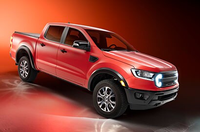 Red car wrap on pickup truck