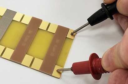 testing electrical resistance in electrically conductive tapes