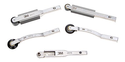 Several metal parts with wheels
