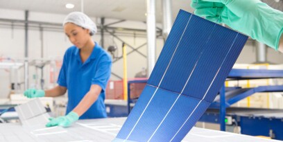 Technicians with solar cell materials and other solar panel solutions
