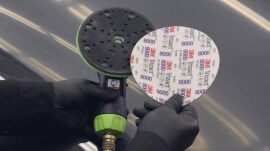 Hookit Foam Abrasive Disc being attached to dual action sander