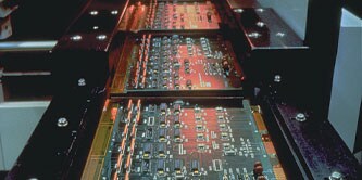 An assembly line of control panels
