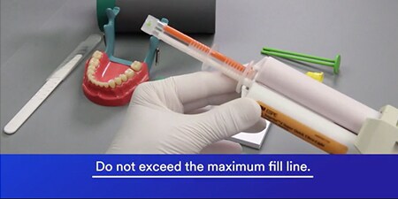 filling the syringe with 3M™ Imprint™ 4 Super Quick Ultra Light
