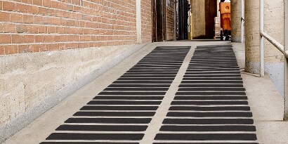 anti-slip treads on a concrete loading ramp
