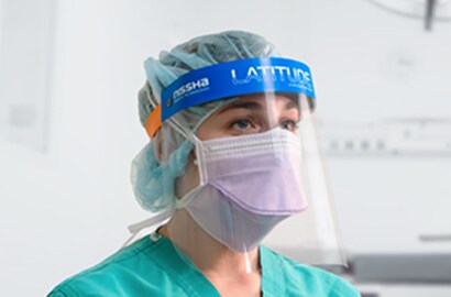 Doctor wearing a LATITUDE™ PLUS protective face shield with 3M™ Anti-Fog Face Shield Film