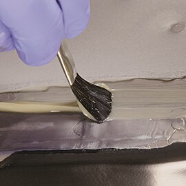 Application of seam sealer on vehicle