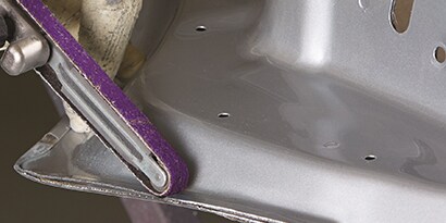 file belt sandergrinding off crimp on door skin
