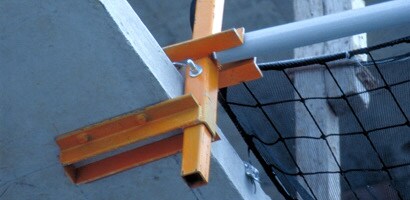 Image of netting system attached to poured concrete floor
