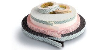 Image of a stack of different rolls of double coated foam tapes
