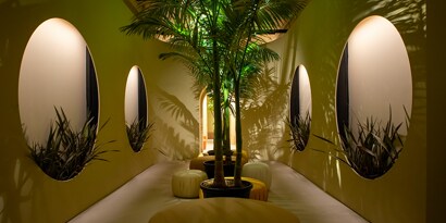 A long hallway decorated in architectural designs
