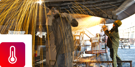 Welders working on large parts/ welding large metal parts
