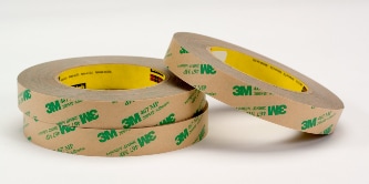 Image of three rolls of adhesive transfer tape
