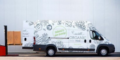 A white van wrapped with a 3M vehicle print film
