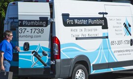 a plumbing company's fleet van wrapped in 3M graphic film with their company logo