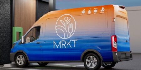 Branded van with MRKT logo demonstrating fleet graphic solutions
