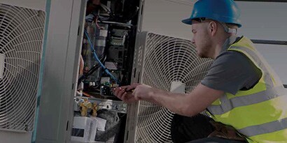 Scotch application image of electrician working on commercial junction box 
