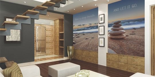 A wall wrap featuring stacked stones decorates a wall in a modern space.
