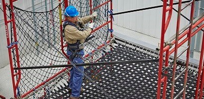 Fall protection trainer in fall protection training facility
