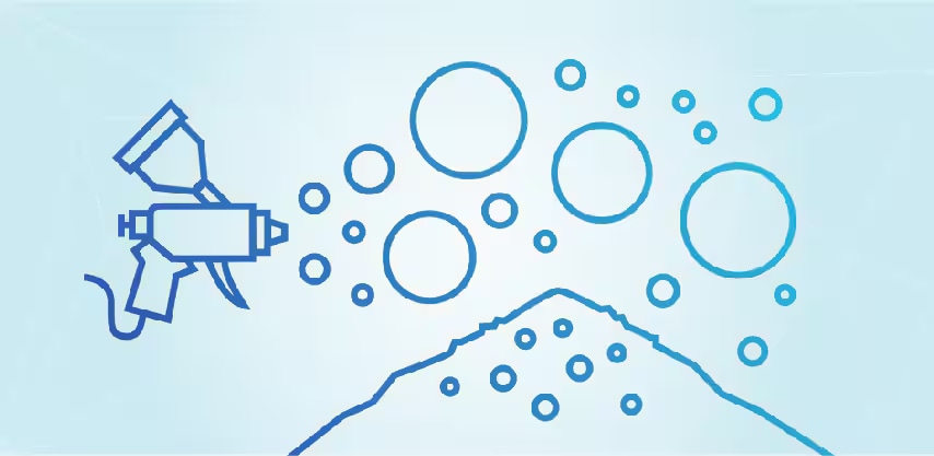 Image a spray gun spraying circular particles onto a triangular surface
