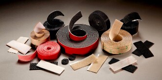 Image of rolls and pieces of reclosable fasteners
