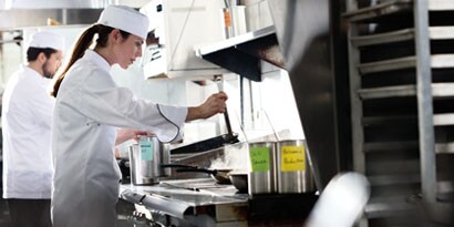 chefs working in a clean kitchen
