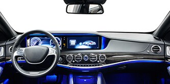 Image of an auto dashboard and steering wheel
