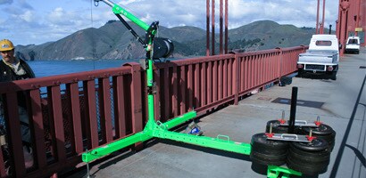 Vertical davit installed at railing of suspension bridge
