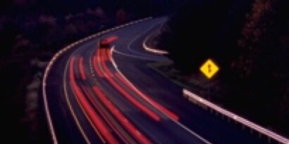 Night road in red lights.
