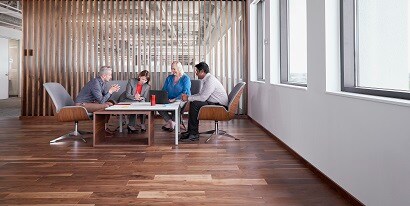 People discussing at table
